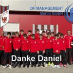 Firma DF Management spendetTrainingsanzüge